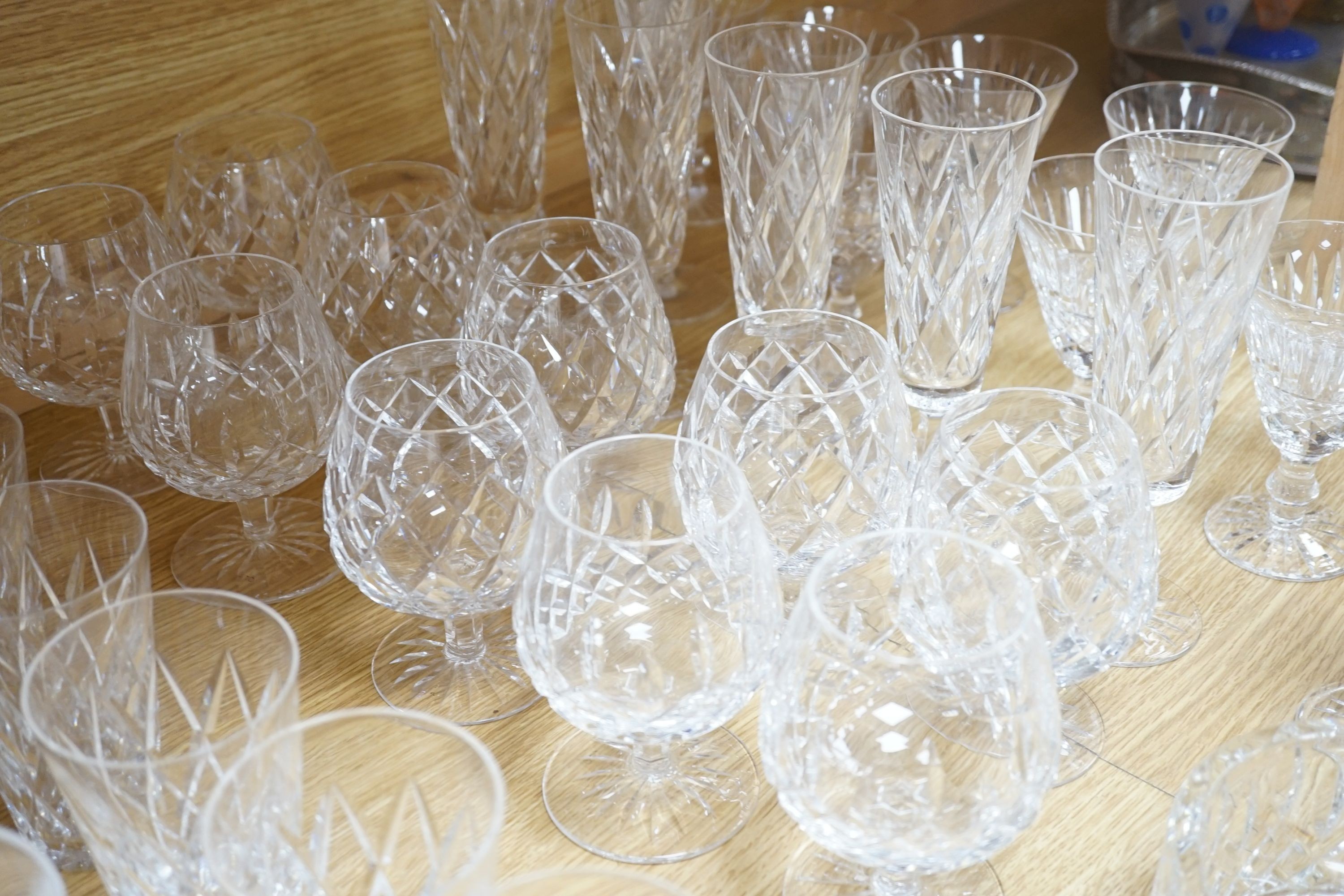 A large comprehensive suite of Waterford Tramore pattern cut crystal drinking glasses